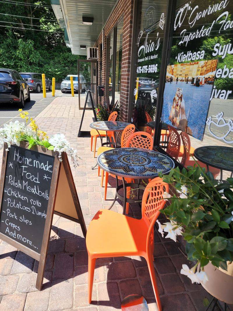 A Modest Storefront Sits Along A Busy Route