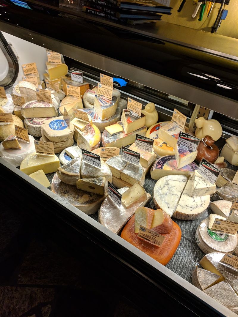 You Order Imported Prosciutto By Weight Inside This Crowded Florida Italian Market - Decor Hint A Cheese Room Built for Slow Browsing