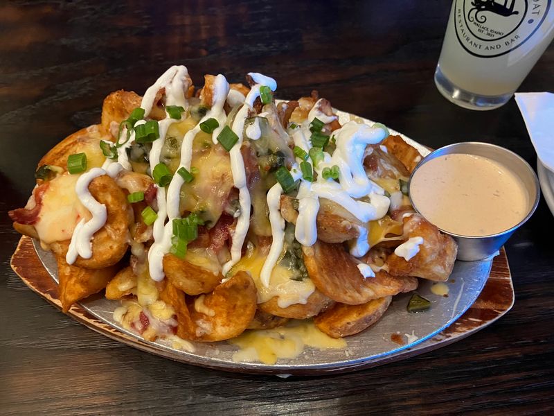 Baskets Of Seasoned Fries And Onion Rings