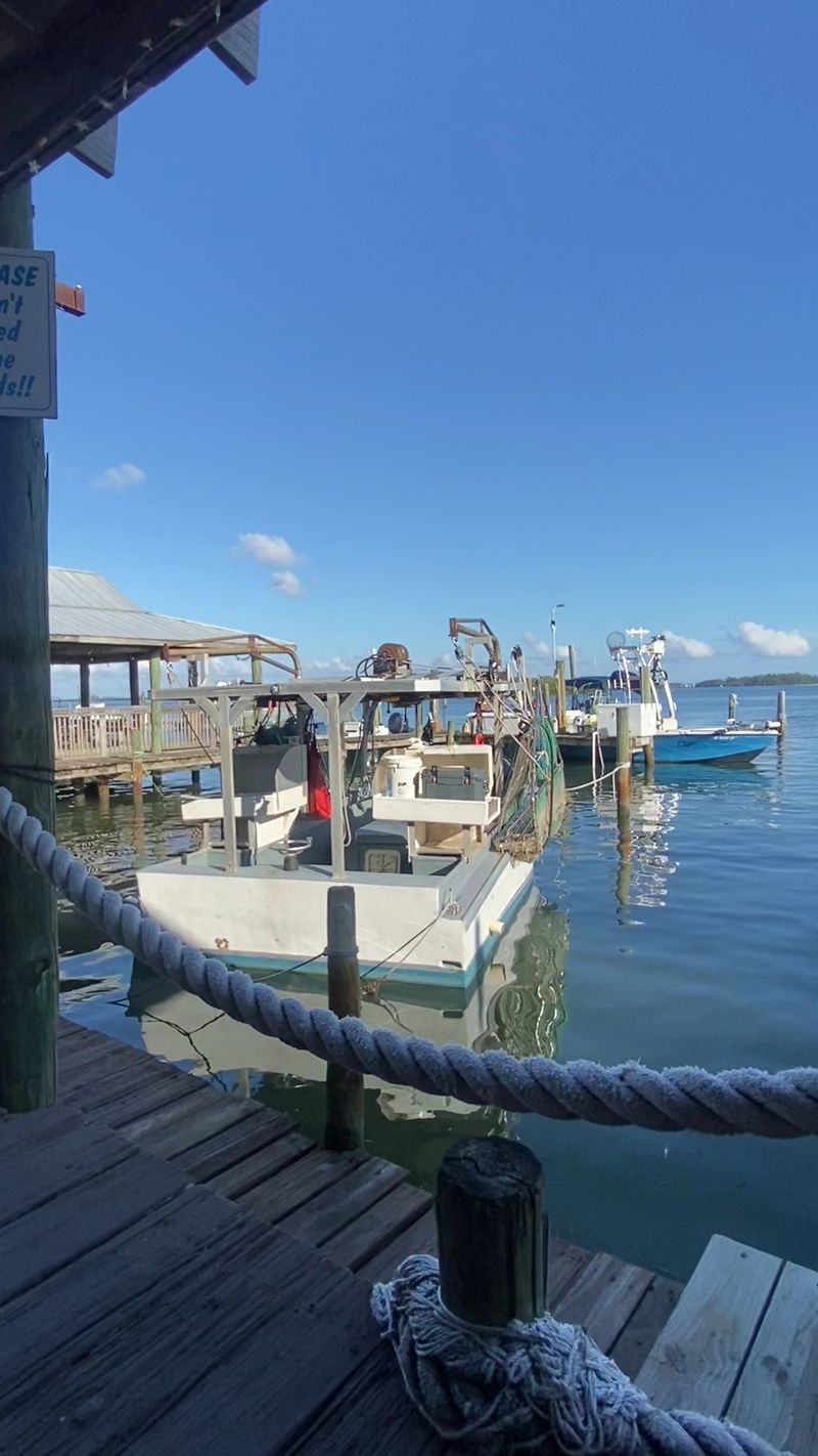 Locals Drive An Hour For The Smoked Mullet At This Florida Fishing Village Smokehouse - Decor Hint A Working Dock at the End of 46th Avenue West
