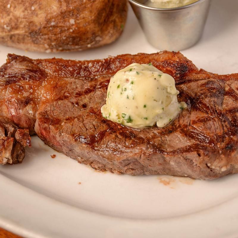 This North Carolina Steakhouse Is Inside A 100-Year-Old Police Station And Serves Steaks Worth Remembering - Decor Hint Pair Your Steak With Classic Sides For The Full Steakhouse Experience