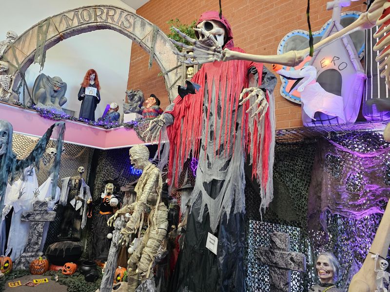 Giant Props And Animatronics Can Turn A Front Yard Into A Full Haunted Scene