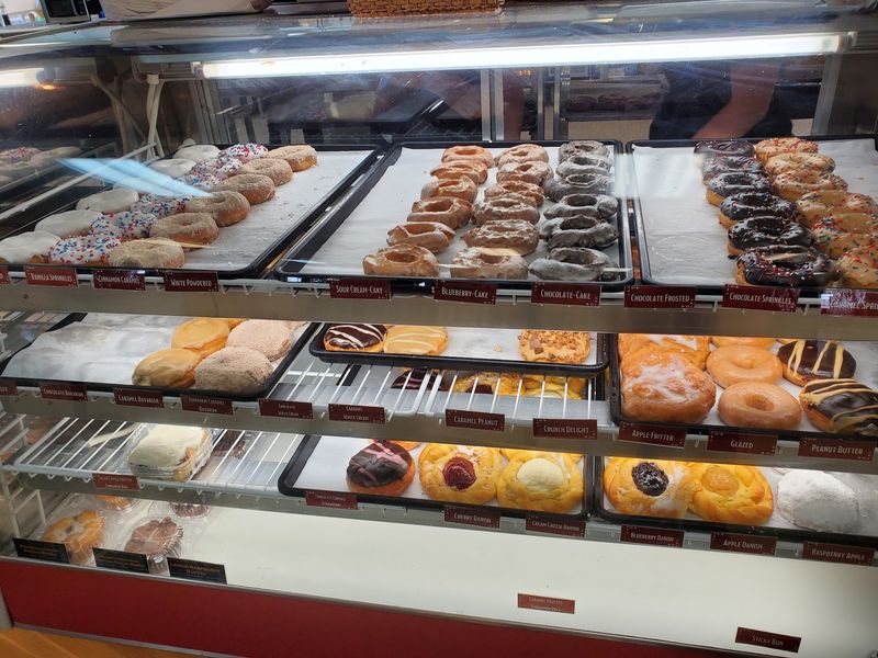 The Small-Town Bakery In Indiana Where Locals Say The Long Wait Is Worth It - Decor Hint Glazed, Filled, And Impossible To Pick Just One