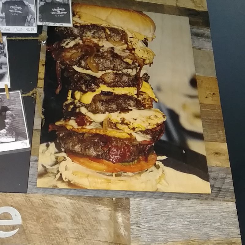 This Nebraska Burger Joint Has Served Hand-Pressed Burgers On Paper Napkins Since 1934 - Decor Hint The Stellanator: Six Burgers, One Brave Eater