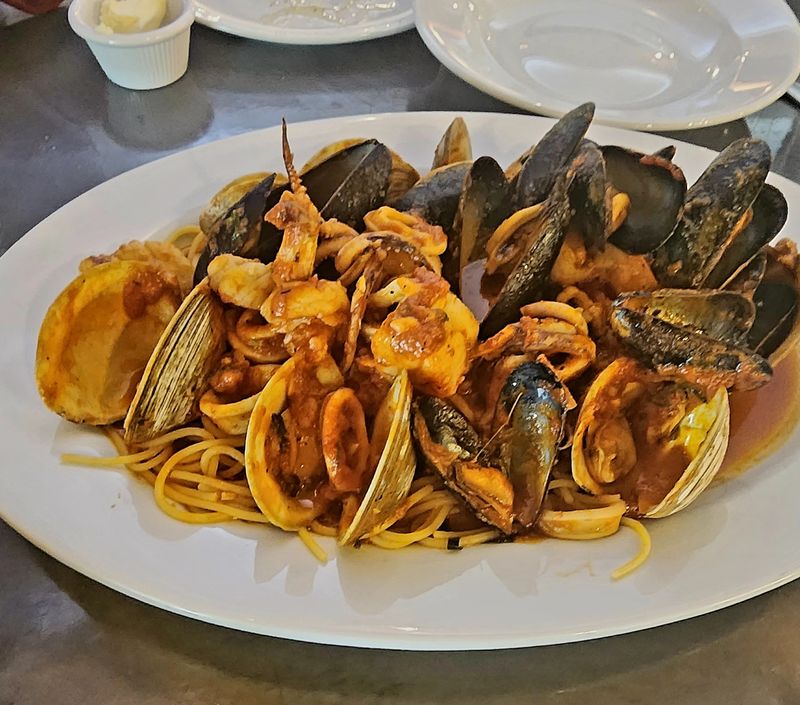 Where Connecticut Locals Go When They Crave A Massive Plate Of Pasta - Decor Hint Generous Portions Make Sharing Tempting
