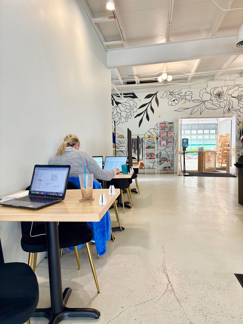 Grab A Latte And Let The Kids Loose At This Kentucky Cafe Built For Toddlers And Tired Parents - Decor Hint A Desk, A Screen, And Bottomless Coffee