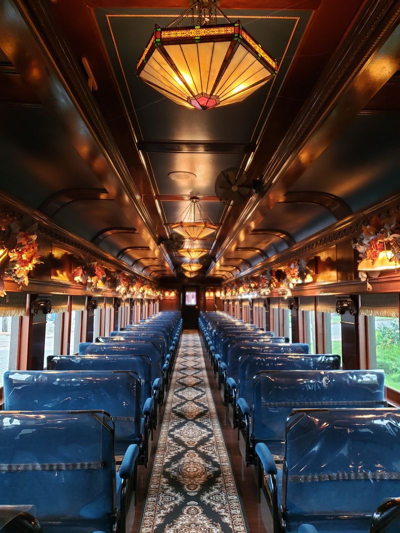 Stained Glass, Brass, and Velvet Seats