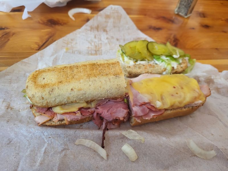 The Small-Town Bakery In Indiana Where Locals Say The Long Wait Is Worth It - Decor Hint The Deli Counter Plays A Savory Card