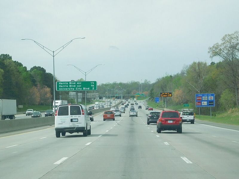 Share The Road With A Constant Stream Of Cars And Trucks