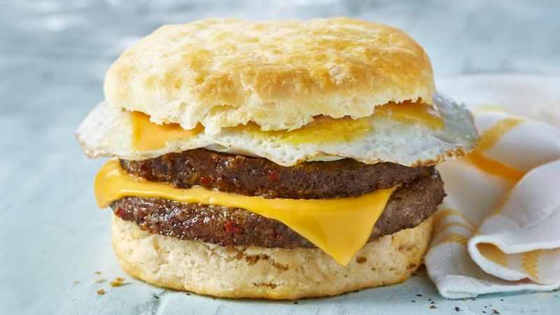 A Three-Egg Meat Lovers Omelet Is Getting Stuffed Inside A Biscuit