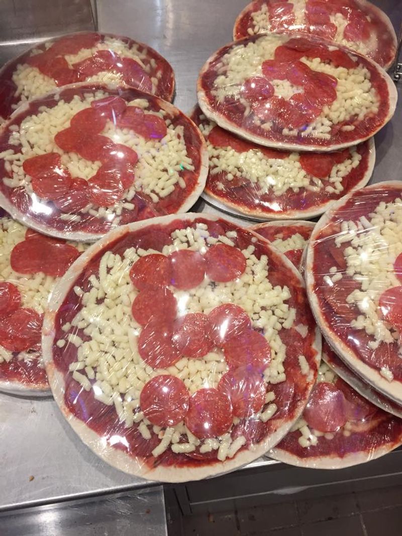 Incredible Pepperoni Pizza Is Hiding Inside This Unassuming Minnesota Italian Restaurant - Decor Hint That Legendary Pepperoni Pie