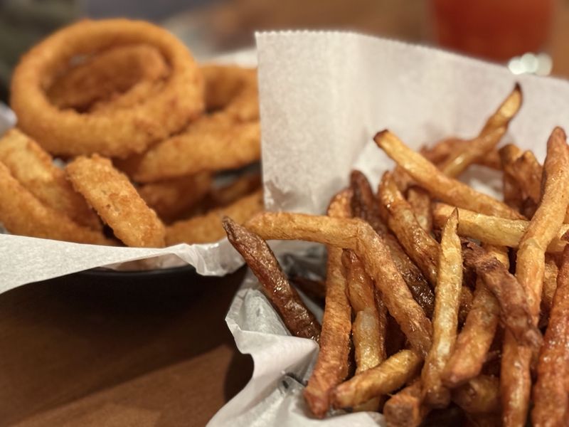 This Nebraska Burger Joint Has Served Hand-Pressed Burgers On Paper Napkins Since 1934 - Decor Hint Fries, Rings, and Crunchy Sidekicks
