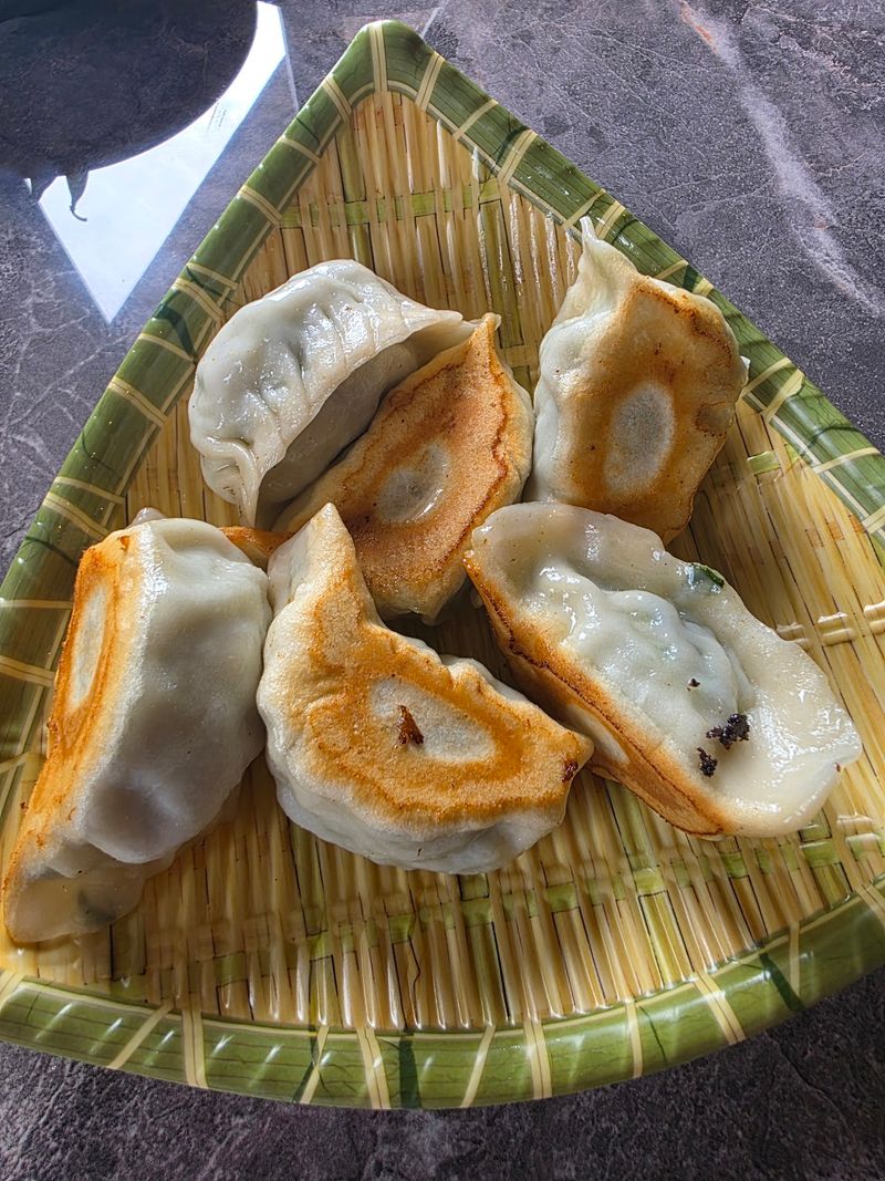 This Brand New North Carolina Restaurant Makes Dumplings Right In Front Of You - Decor Hint Choose Pan-Fried Dumplings For A Crisp Bite