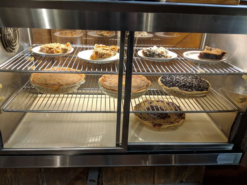 Pie Case Temptations And Cinnamon Rolls