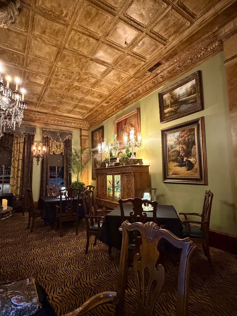 Chandeliers, Lion Statues, And A Christmas Room