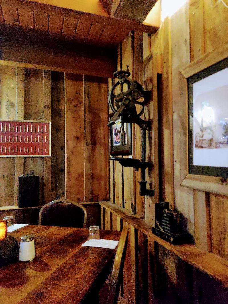 Log Cabin Booths And String Lights Set The Mood