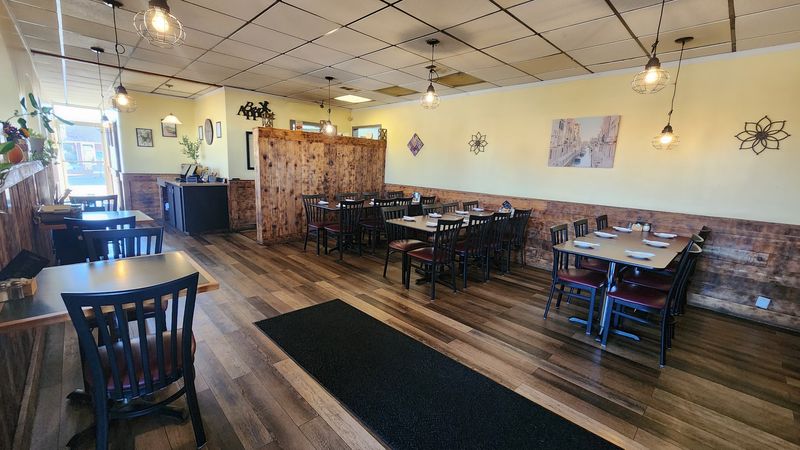 Nebraska Travelers Keep Stopping At This Low-Key Restaurant For The Lobster Ravioli - Decor Hint Who Fills the Tables
