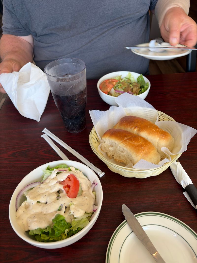 Nebraska Travelers Keep Stopping At This Low-Key Restaurant For The Lobster Ravioli - Decor Hint Warm Bread and the Side Salad Ritual