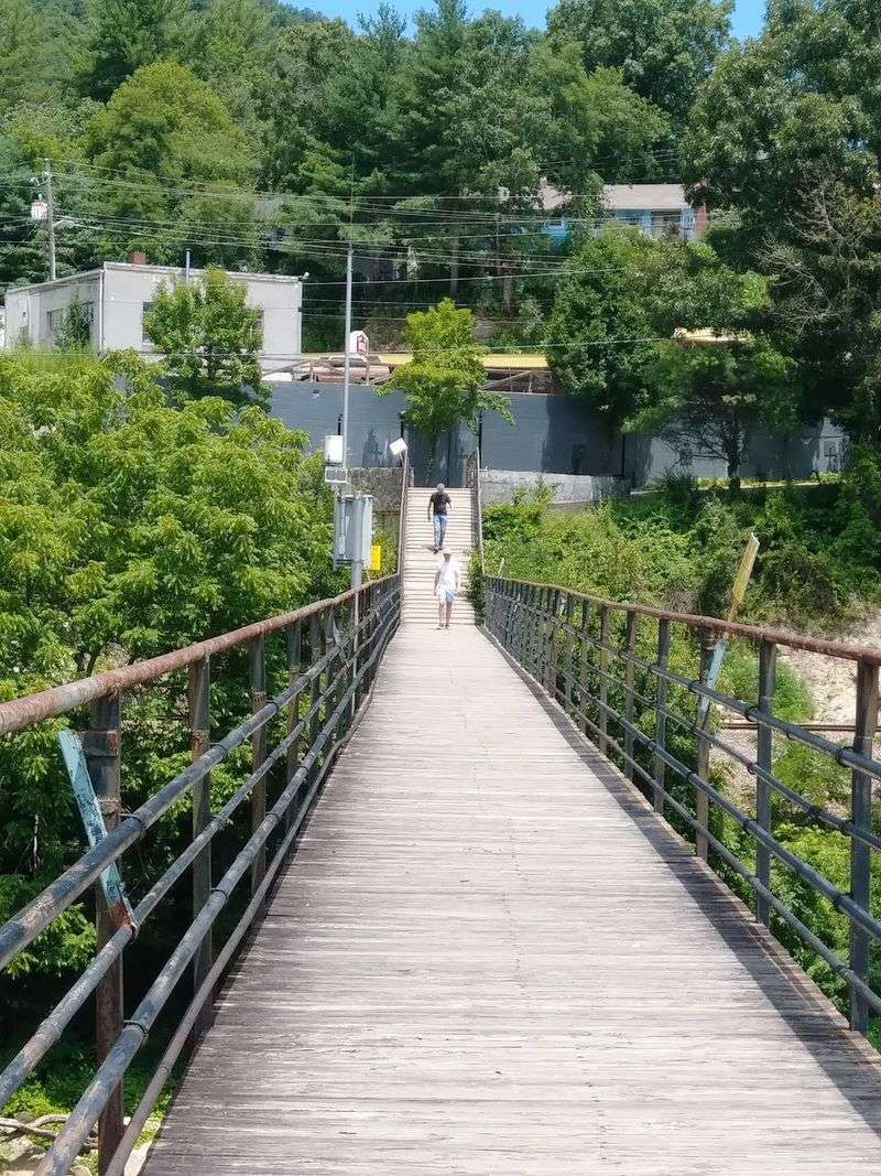 A Historic Footbridge Connects The Business District With Riverside Park