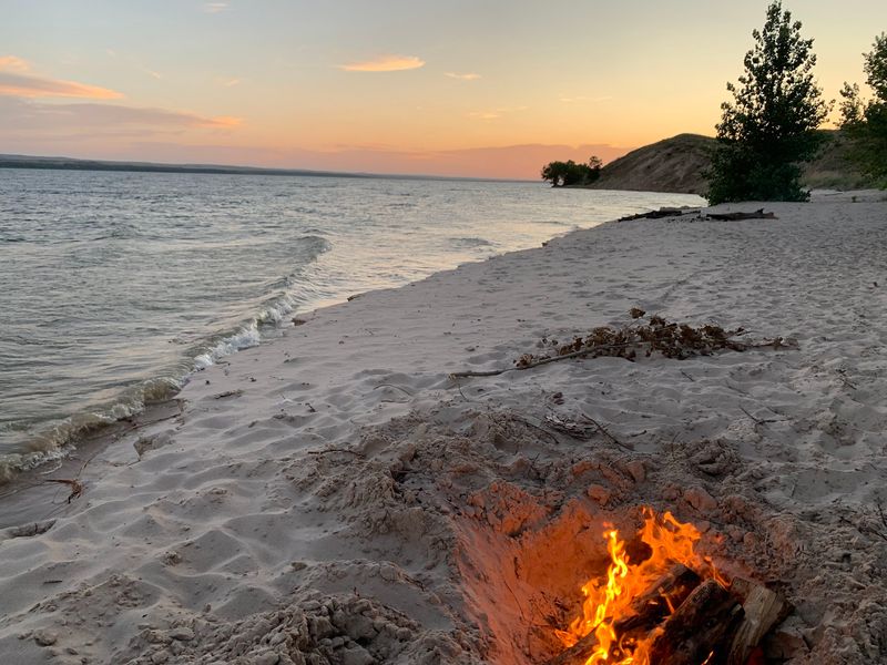 Camping Right Where the Water Meets the Sand