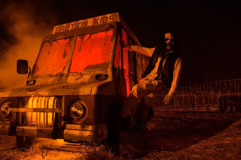 This California Haunted Hayride Drops You Into A Cursed Town Stuck On Halloween Night In 1985 - Decor Hint Midnight Falls Town Square Is Full Of Characters