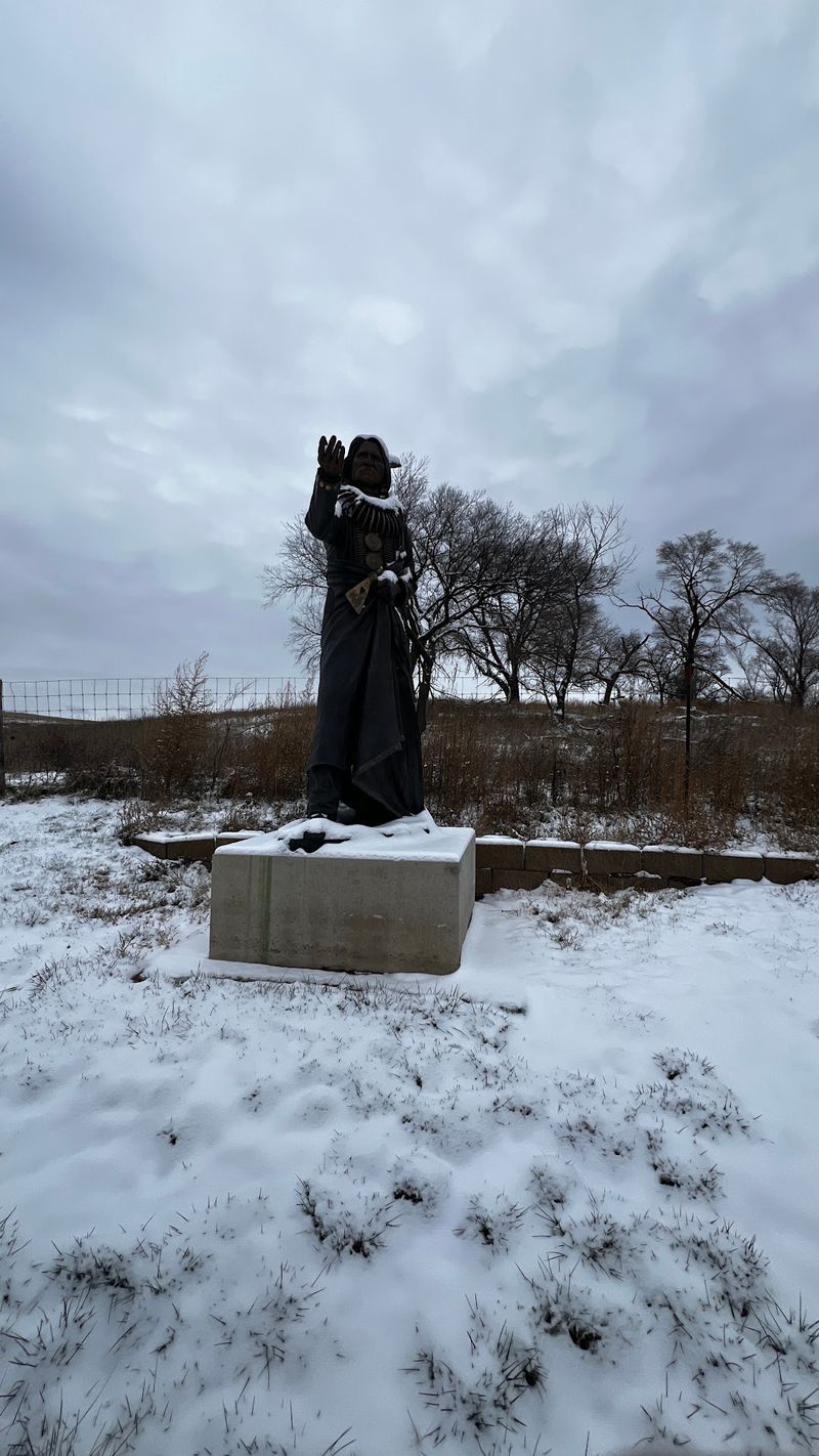 The Cemetery Under The Statue's Gaze