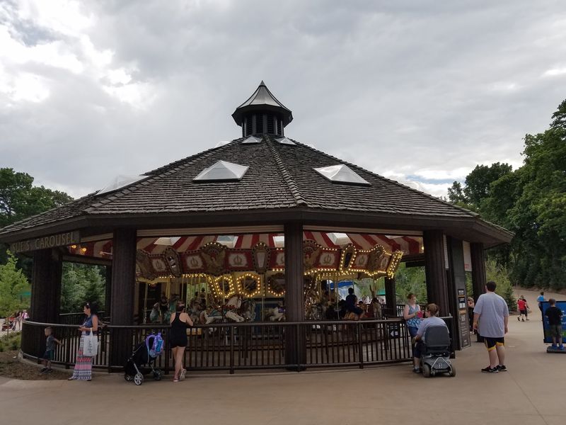 The Old-Fashioned Nebraska Carousel Where Kids Ride Tigers And Giraffes For $4 Every Summer - Decor Hint Picking Your Animal Before the Platform Fills