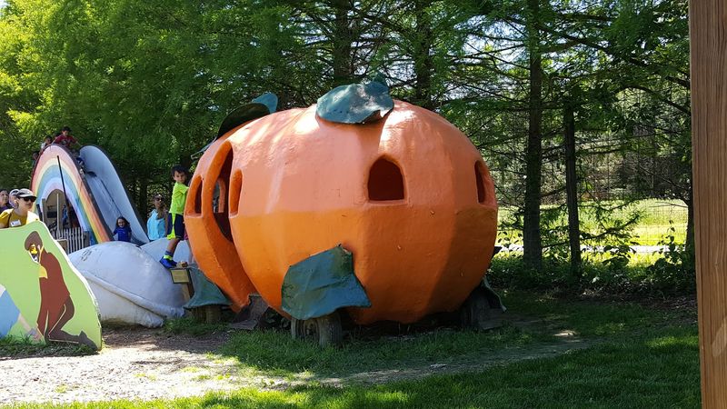 Fairy Tale Figures Parked Between Real Live Goats