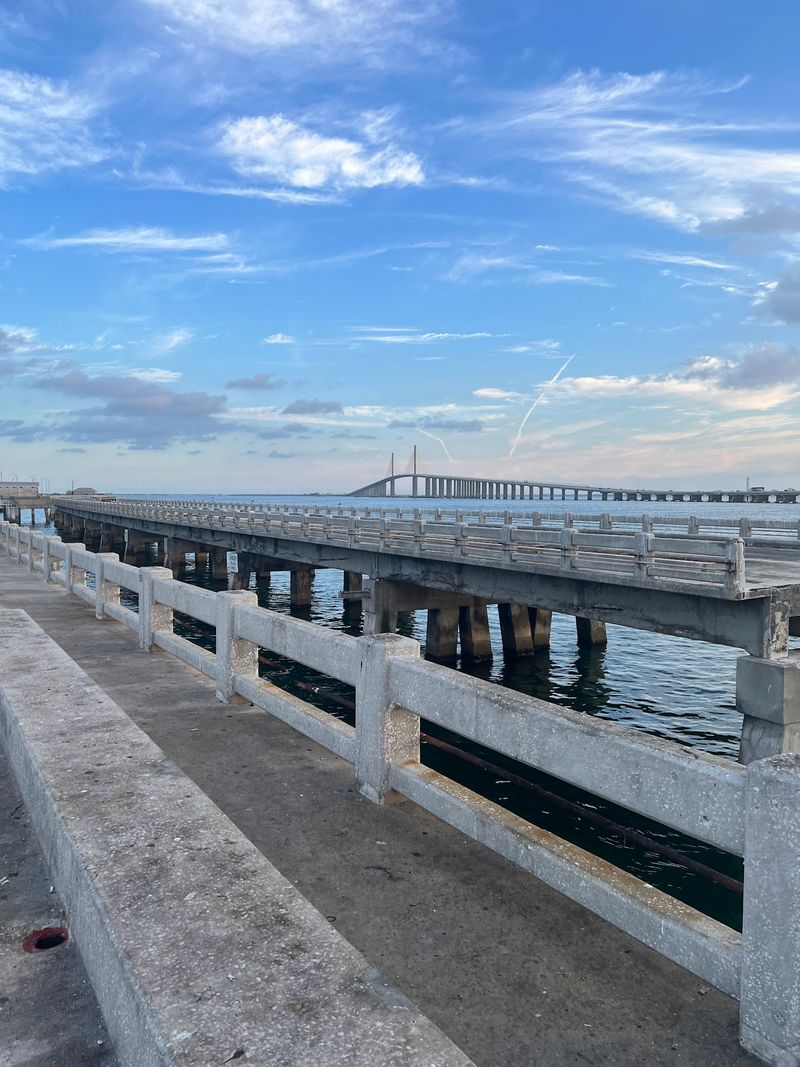 Driving over Florida's Tallest Bridge Hands You the Best View of Tampa Bay - Decor Hint Fishing Piers at Both Ends