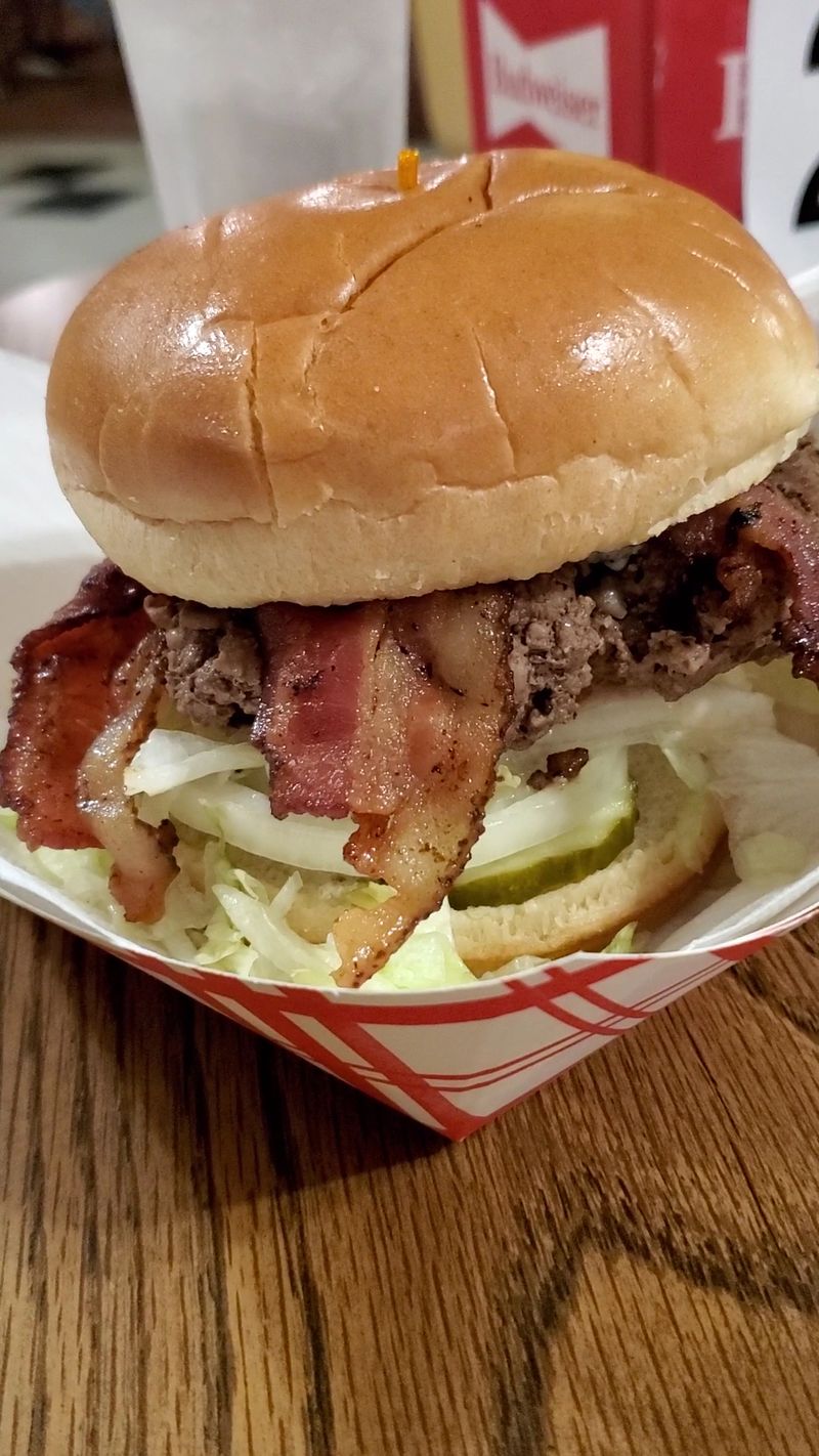 This Nebraska Burger Joint Has Served Hand-Pressed Burgers On Paper Napkins Since 1934 - Decor Hint Hand-Pressed Beef and the Well-Done Default