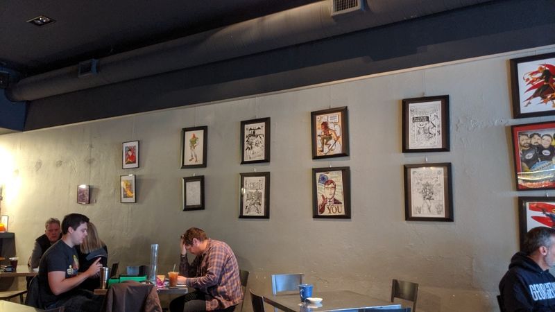 This Nebraska Comic Shop Brews Locally Roasted Coffee And Has Quiet Corners For Diving Into Comics - Decor Hint Game Nights, Dice, And A Community Room That Stays Busy