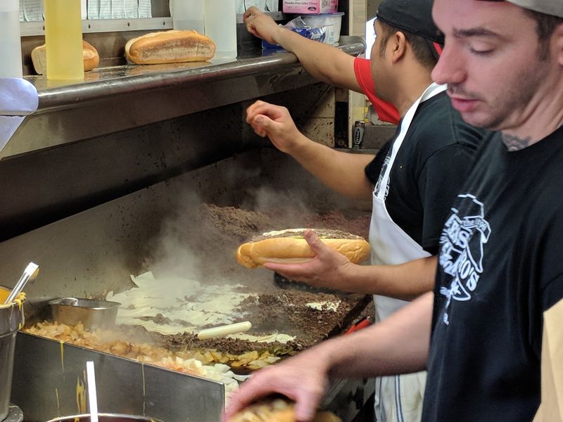 Cheesesteaks Come Out Wrapped In Paper At This Old Pennsylvania Corner Shop That Never Changed Its Grill - Decor Hint The Flat-Top Grill Does All The Heavy Lifting Here