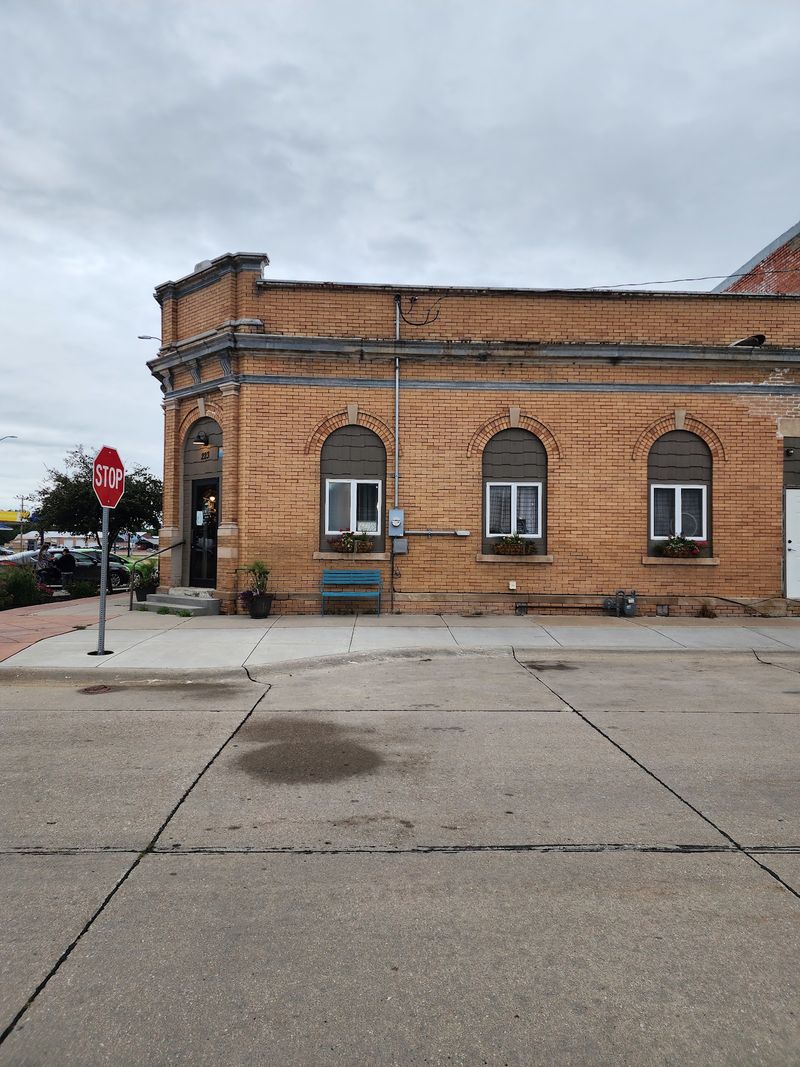 Started As A 1920s Bank, This Nebraska Building Now Pours Coffee From Inside The Old Vault - Decor Hint The Farmers State Bank Years That Built This Corner
