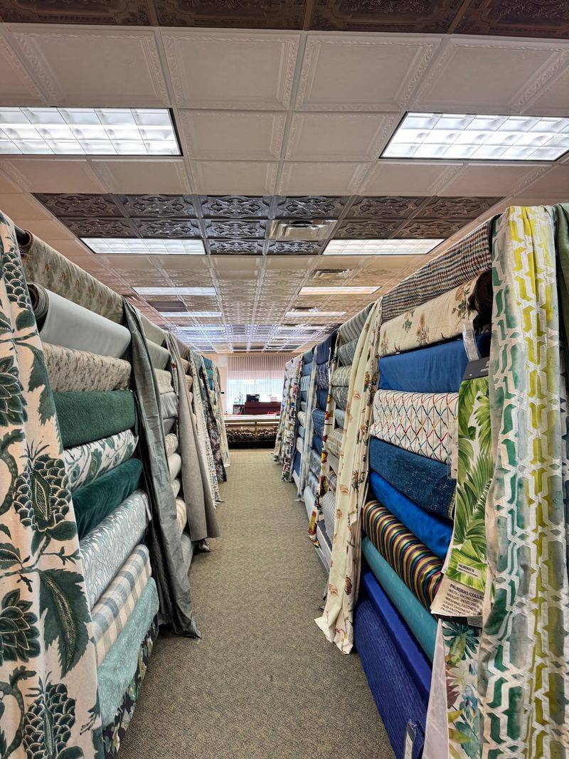 This Under-The-Radar Florida Fabric Showroom Has Sold Discount Designer Fabrics For Over 30 Years - Decor Hint Aisles Sorted By Color And Fabric Type