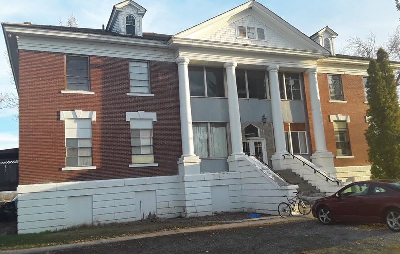Visitors Take A Spooky House Tour, Then Walk Through This Haunted Idaho Hospital - Decor Hint The 1921 Story Behind These Walls Is The Real Opening Act
