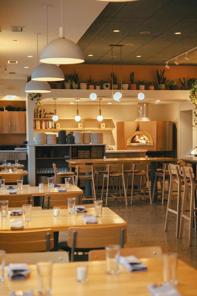 The Adventurist Says A Michelin Bib Gourmand Would Make Sense At This Michigan Pizza And Pasta Spot - Decor Hint A Patio Facing The Park Makes Summer Dinners Easy