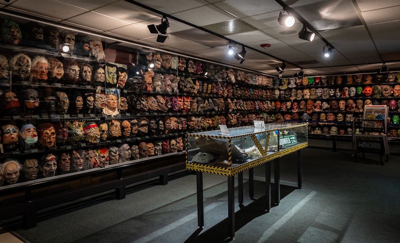 This Michigan Museum Has A Petrified Fairy, Chupacabra Skull, And Thousands Of Strange Little Treasures - Decor Hint Hundreds Of Vintage Halloween Masks Will Stare Right Back