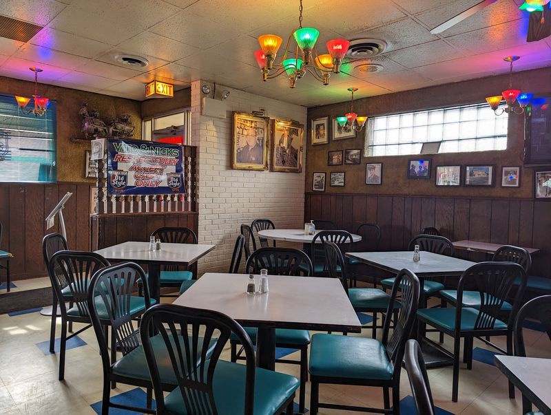 An Illinois Pizzeria Serves Cracker-Thin Tavern Squares So Crispy Locals Fight For The Corner Pieces - Decor Hint The Dining Room Keeps Its South Side Personality