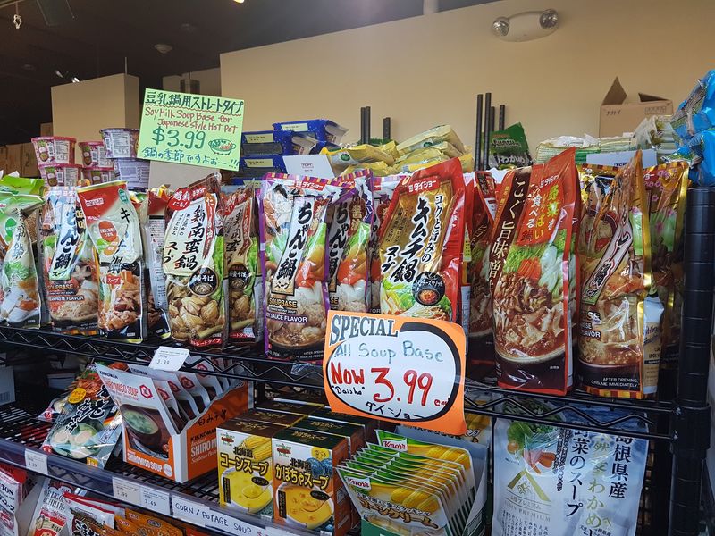 Shelves Filled With Colourful Snacks And Imported Treats