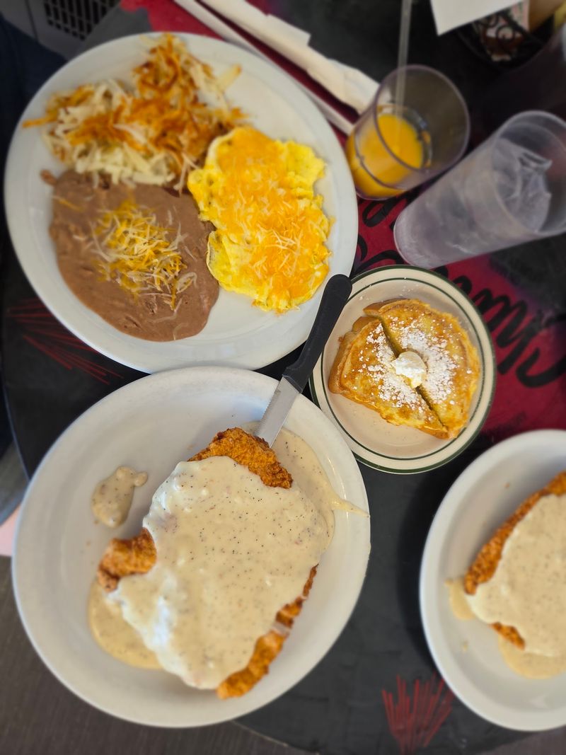 The Chicken Fried Steak That Hangs Off The Plate