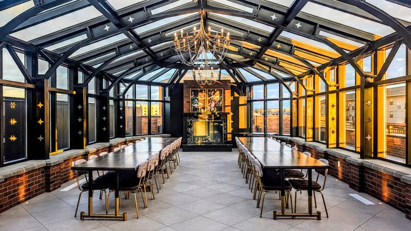 This Idaho Bookstore Has A Cozy Reading Nook Where You Sit With A Book And A Coffee Without Any Rush - Decor Hint The Glass-Roofed Conservatory Upstairs Steals The Show