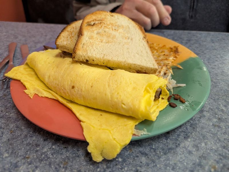 An Entire Side Of The Menu Belongs To Omelets, And Their Names Are Wild