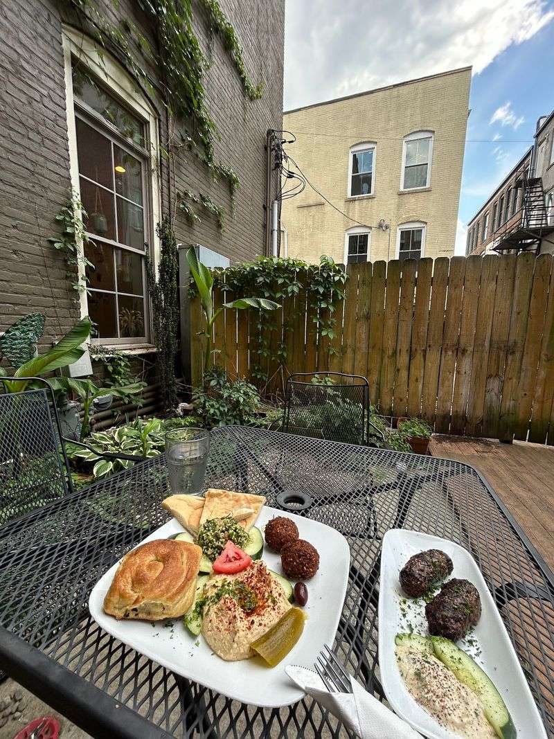 This North Carolina Restaurant Brings The Flavors Of Jerusalem To Life With Falafel And Shawarma Locals Love - Decor Hint Save A Sunny Afternoon For The Fenced Back Patio