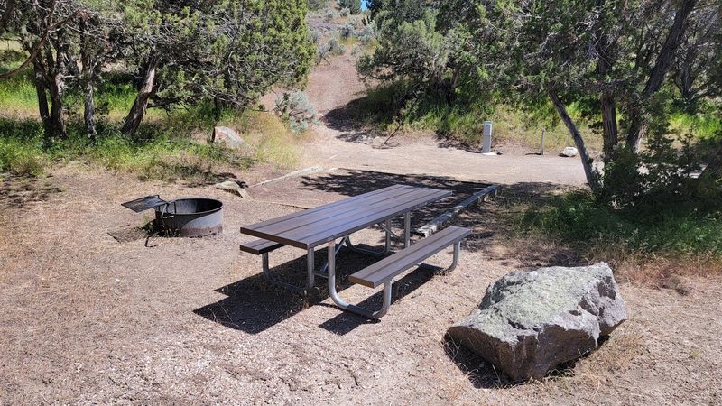 Visitors Hike Past Pioneer Tracks Pressed Into Rock At This Idaho Spot Near The Snake River - Decor Hint Campsites With Hookups And A Lower Loop Worth Requesting