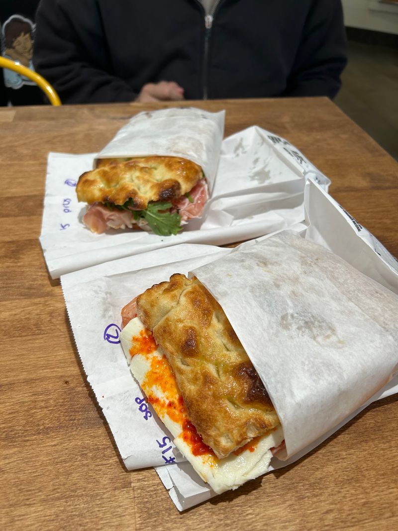 This Georgia Italian Bakery Serves Fresh Bread, Roman-Style Pizza, And Creamy Gelato - Decor Hint The Mortadella Panini Might Ruin Other Sandwiches For You
