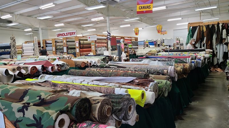 This Ordinary North Carolina Storefront Hides A Fabric Warehouse With By-The-Pound Bargains - Decor Hint Faux Fur, Camo, And Glitter Share The Same Aisles