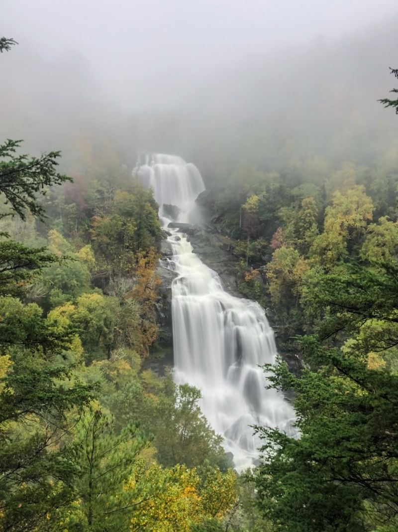 This 411-Foot North Carolina Waterfall Is Roaring With Millions Of Gallons Of Water After Days Of Heavy Rain - Decor Hint Stay Behind The Overlook Barriers Because The Gorge Below Is Extremely Dangerous