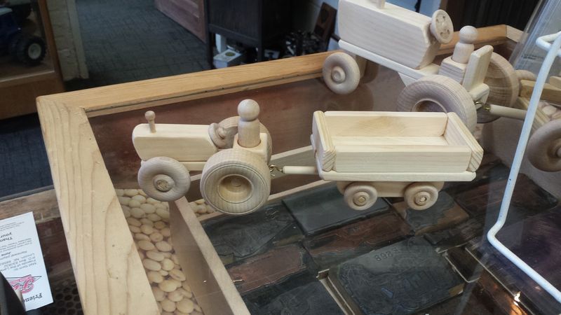 Carburetors, Toys, and Farm Art on the Walls