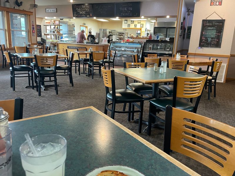 The Cinnamon Rolls At This Michigan Cafe Are So Massive They Barely Fit On The Plate - Decor Hint From Ice Cream To A Roadside Staple