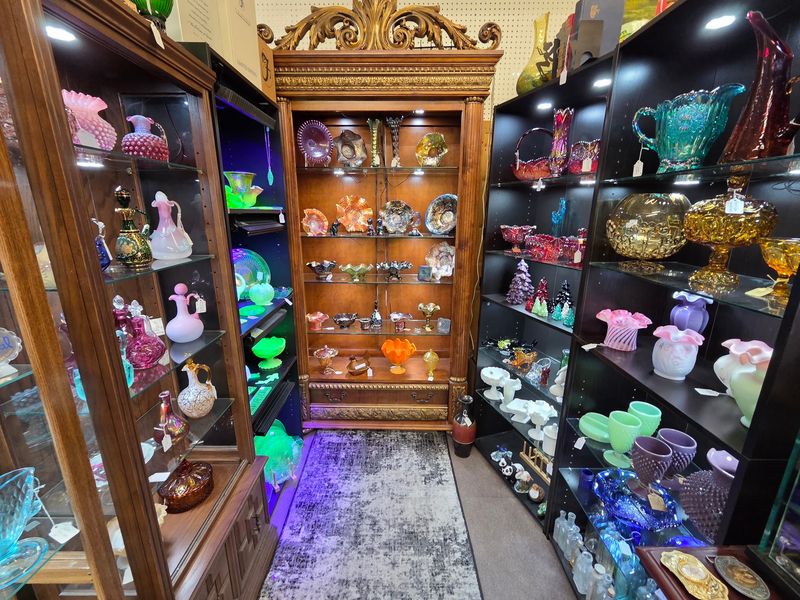 Coins, Glass, And Glowing Shelves